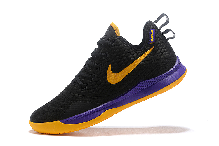 purple and yellow basketball shoes
